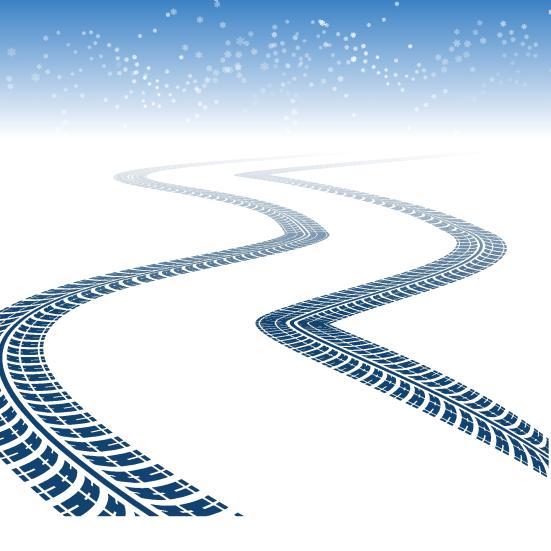 Hjulspor i sneen på en glat vej